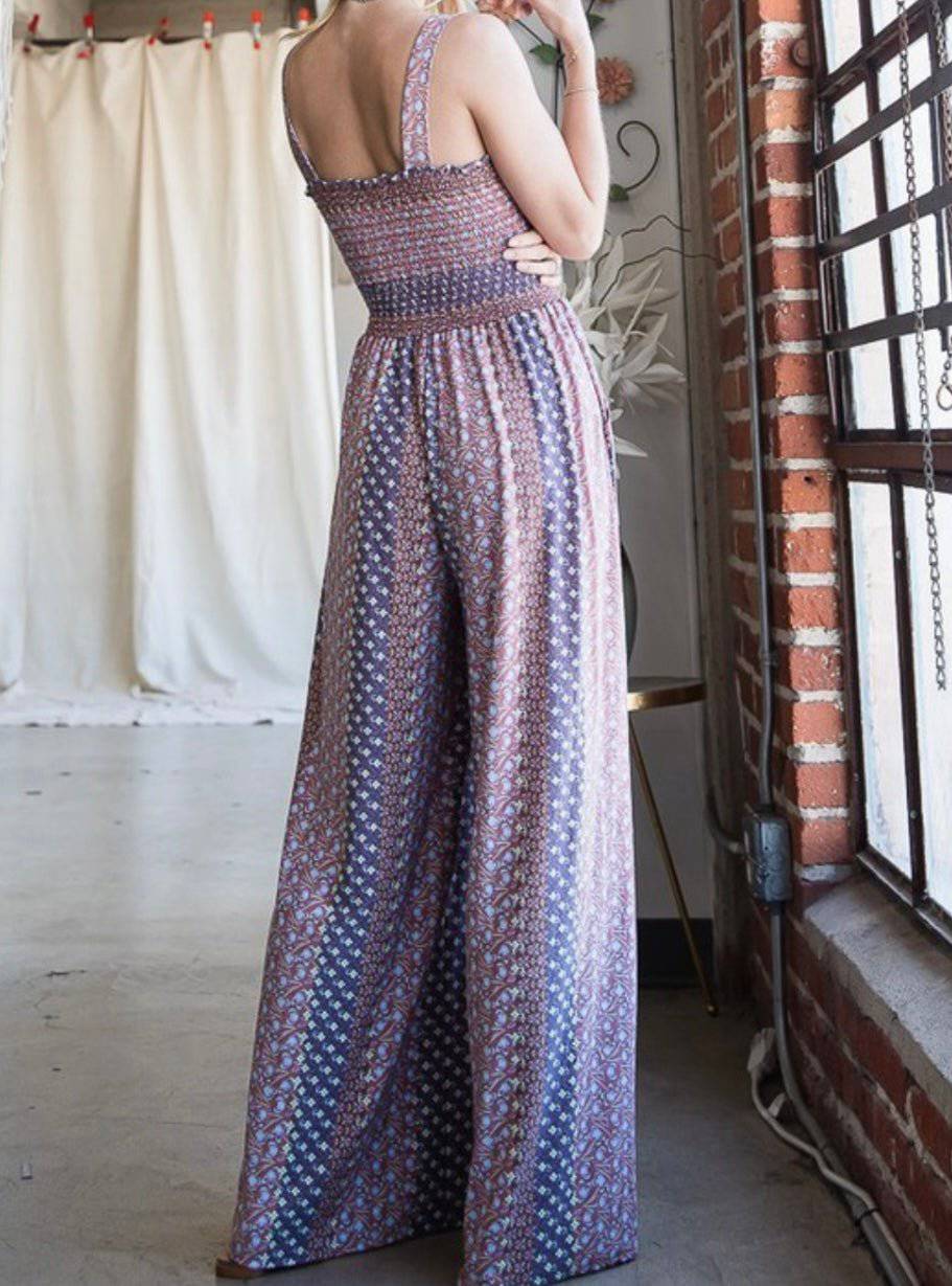 Floral Print Smocked Bodice Knit Jumpsuit with Wide Legs and Pockets - Bella Boutique & Bellasbylola.com