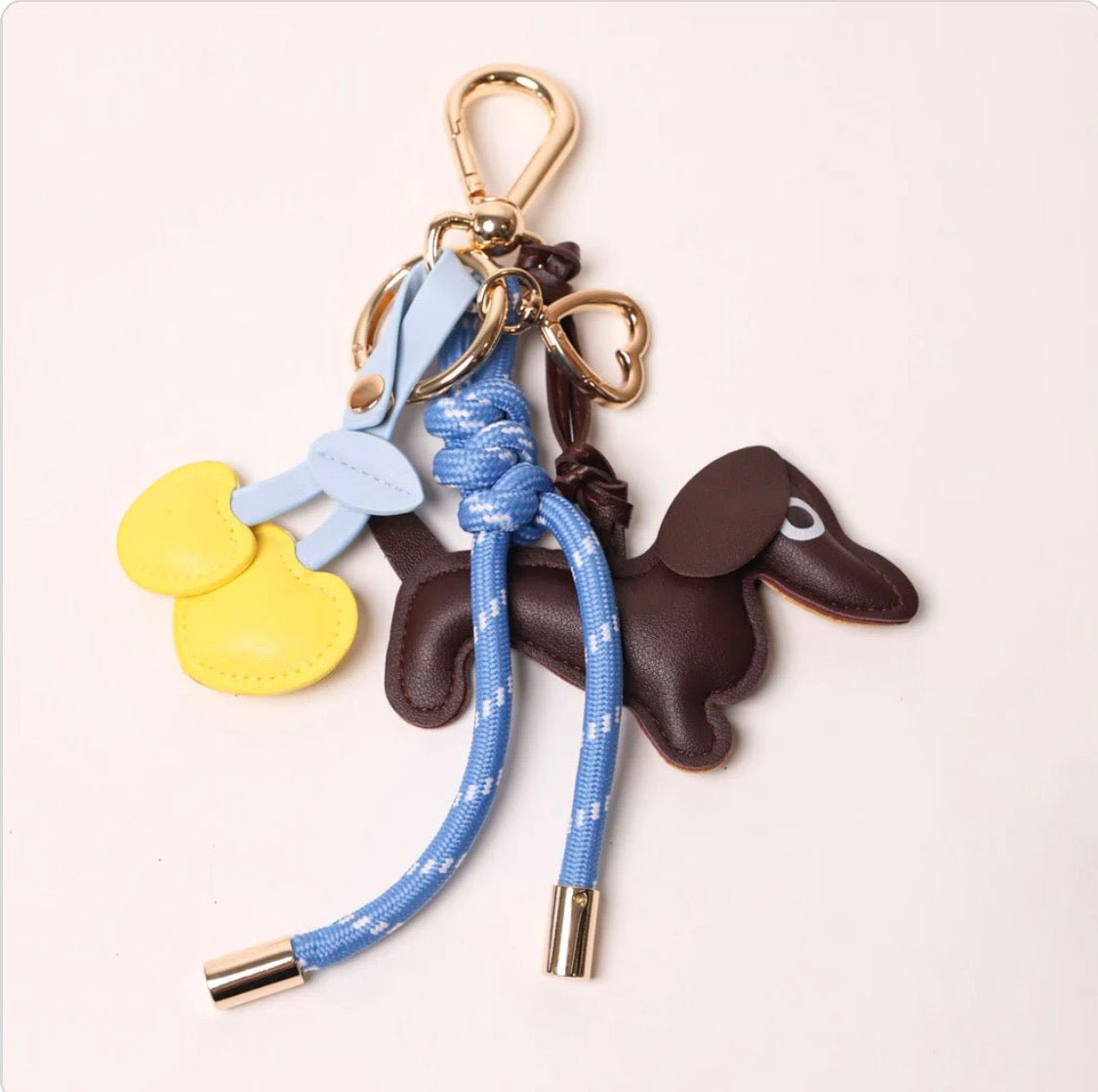 KEY CHAIN BLUE WITH CHARMS - ESPRESSO DOG AND YELLOW HEART CHERRIES - Bella & Bellasbylola.com