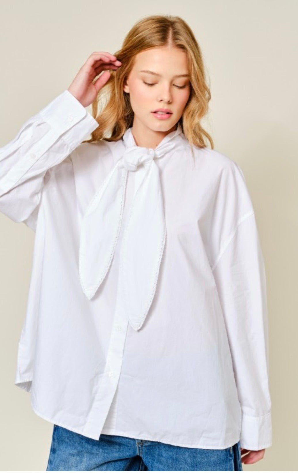 Elegant White Blouse with Oversized Fit and Front Tie Detail - New⨠- Bella Boutique & Bellasbylola.com