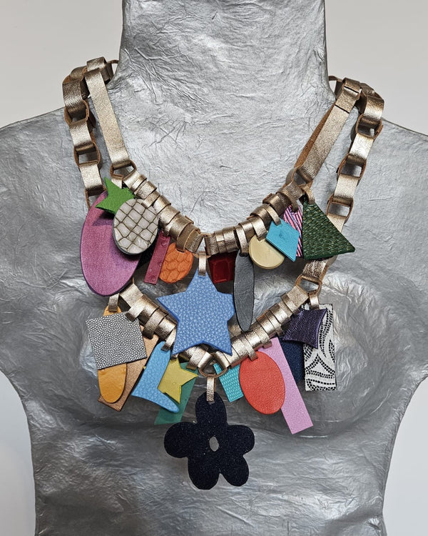 Stars & Flower Gold & Baby Blue Leather Necklace by Arlene Diaz 🇵🇷 - Stylish and Elegant Jewelry Piece /Bellasbylola.com